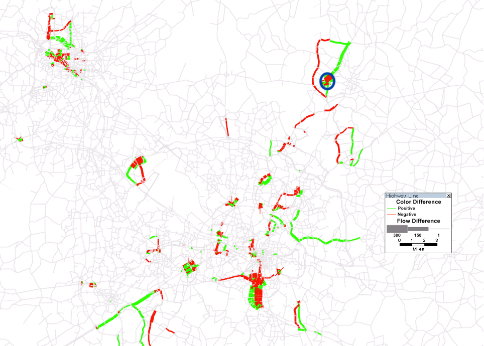 Difference in assigned volumes when adding a lane in area with blue circle.